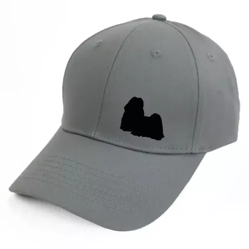 Keps med en Shih Tzu