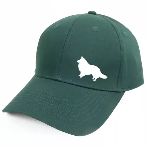 Keps med en Shetland Sheepdog