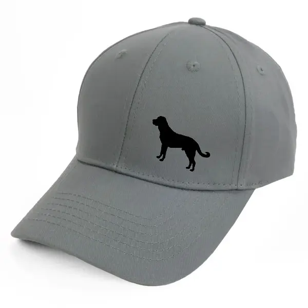 Keps med en Sredneasiatskaja Ovtjarka