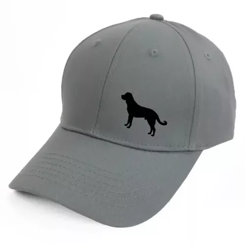 Keps med en Sredneasiatskaja Ovtjarka