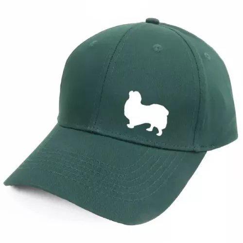 Keps med en Tibetansk Spaniel