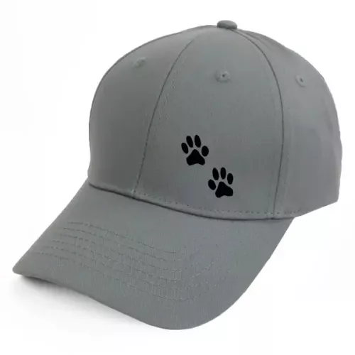 Keps med ett tassavtryck