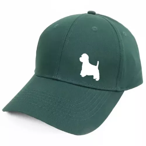 Keps med en West Highland White Terrier