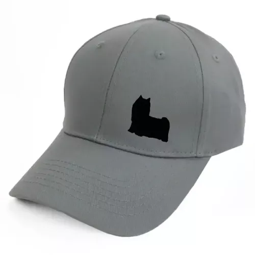 Keps med en Yorkshireterrier