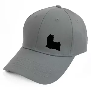 Keps med en Yorkshireterrier