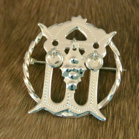 bältesspänne i silver