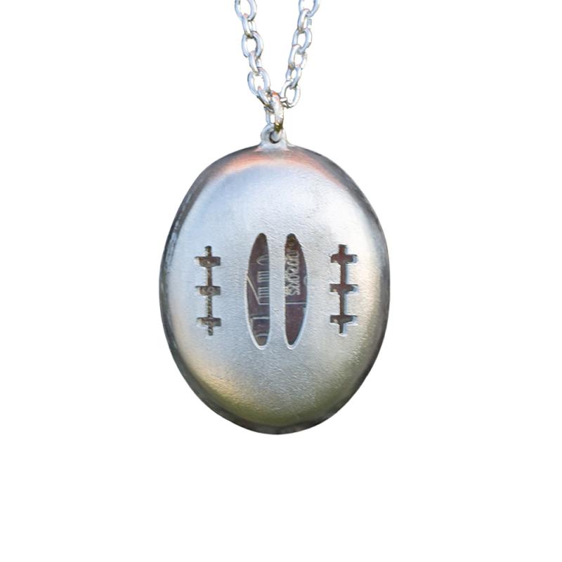 baksida Spåtrumma halssmycke i tenn