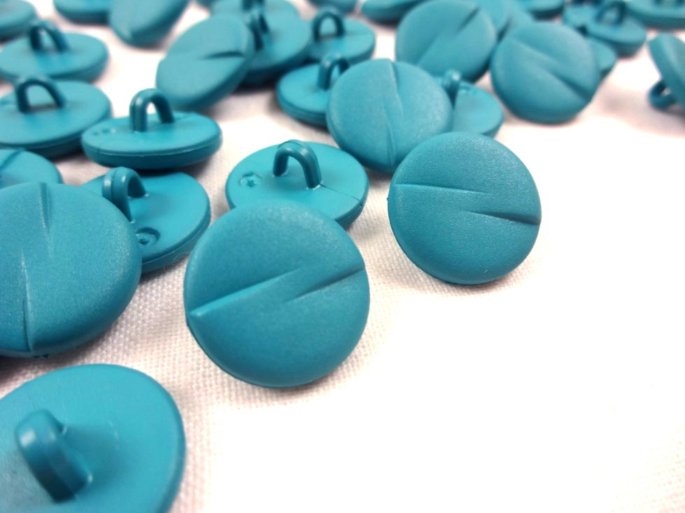K043 Plastic Button 15 mm Lines turquoise