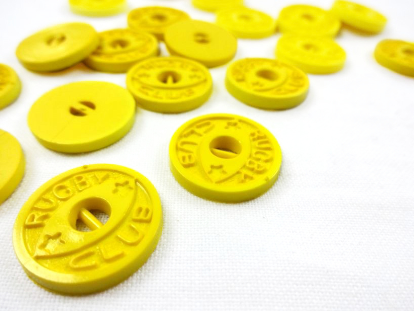 K913 Plastic Button Rugby 18 mm light yellow