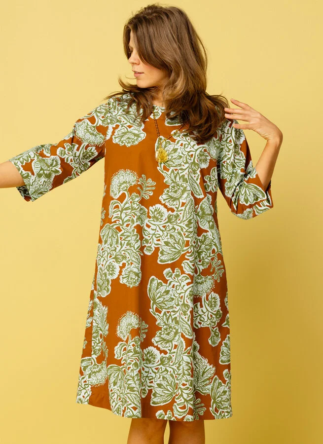 AMORE klänning Knopp