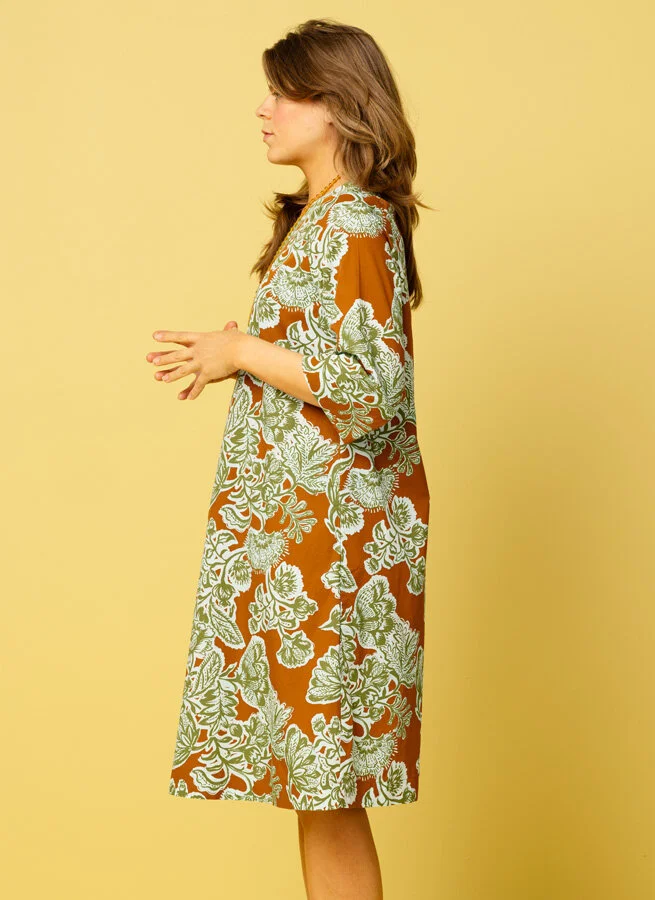 AMORE klänning Knopp