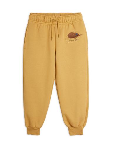 Sweatpants med broderad näbbmus - beige/gul