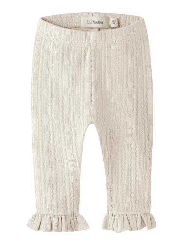 Ribbstickade leggings med volang - vit