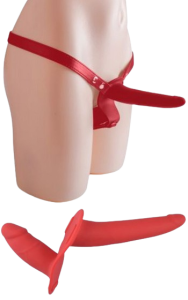 Strap-on med dubbla dildos av silikon, bärs av henne.
