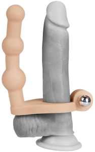 Supermjuk strap-on med analkulor och vibrator.