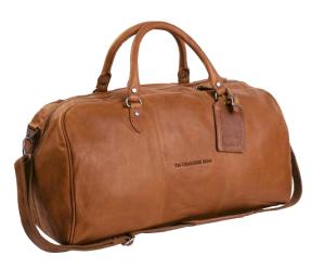 cognacsfärgad weekendväska i läder av modellen william från varumärket the chesterfield brand