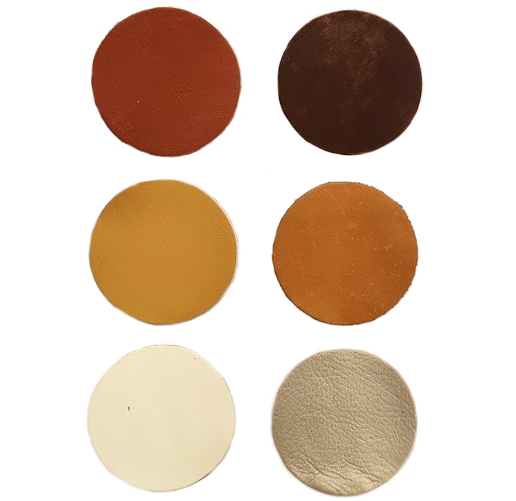 Sex olika nyanser av runda bruna lagningslappar i läder