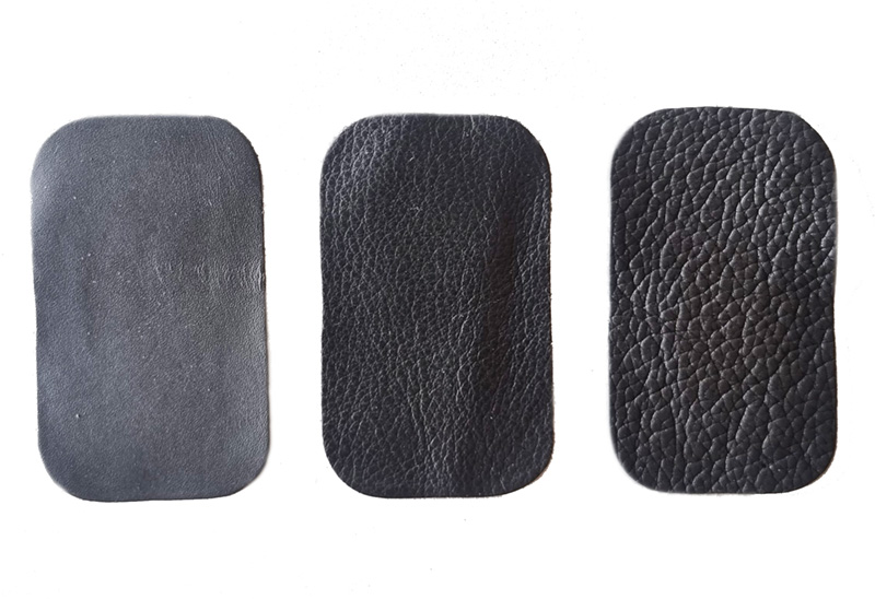 tre stycken svarta lagningslappar i läder med olika grovlek i mönster
