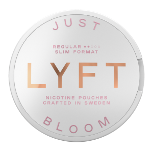 Vit dosa med brons och lila text som det står LYFT just bloom regular med två lila prickar för styrka.