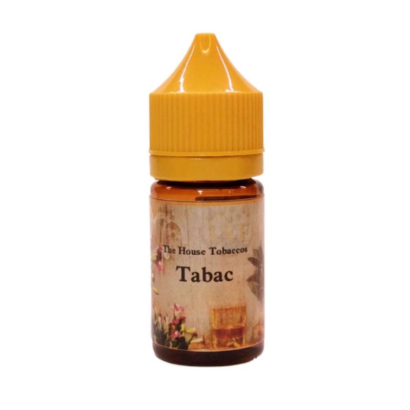 En amberfärgad 30ml flaska med orange skruvkork. På etiketten står det "the house tobaccos" Tabac med svarttext
