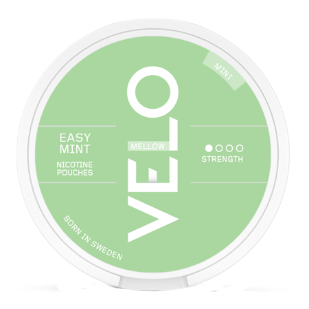 Grön dosa med vit text som det står velo easy mint mellow mini med en vit prick för styrka.