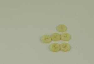 Vitmelange 18mm - 10 knappar