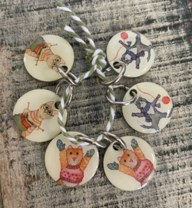 Katter i vantar - stickmarkörer