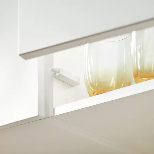 Tip-on Utstötare för luckor