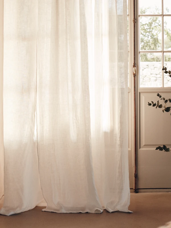 Linen curtains for soft summer light at home