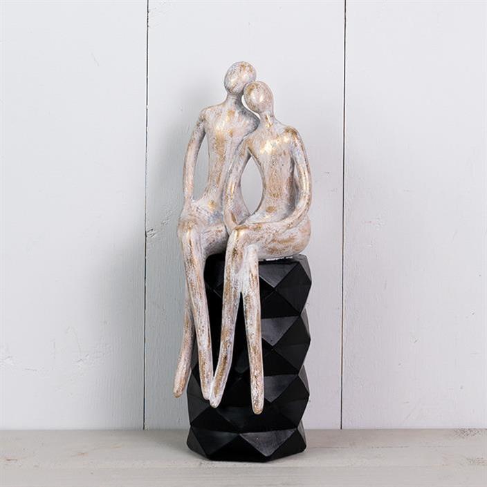 Skulptur sittande par H27cm