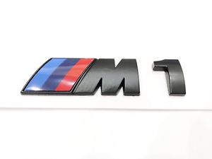 bmw m1 emblem i svart