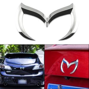 mazda m logo emblem till  bagageluckan