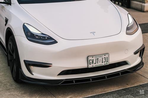 tesla model y front läpp  galar