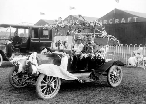 Couple in car with flowers, Greeting Card