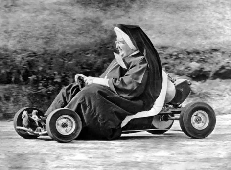 Nun on a go kart, Greeting Card