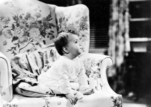 Baby in armchair, Greeting Card