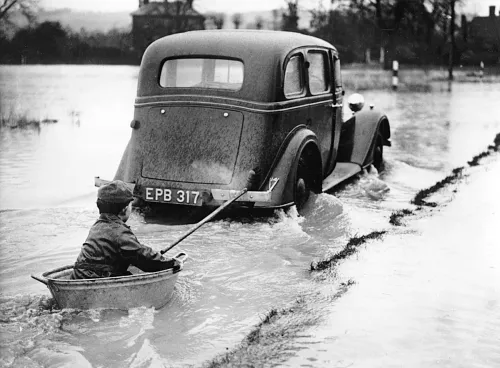 Getting a tow through the floods, Greeting Card