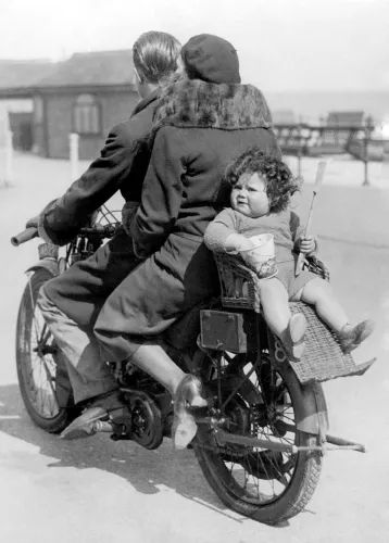 Toddler on back of motorbike, Greeting Card