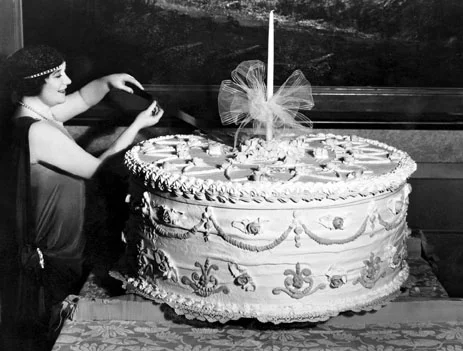 Mrs Wade cutting an enormous birthdaycake,20s, Greeting Card