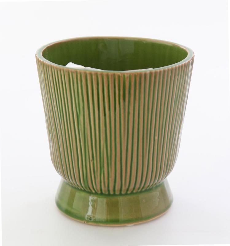 Kruka räfflad på fot mellan ljusgrön