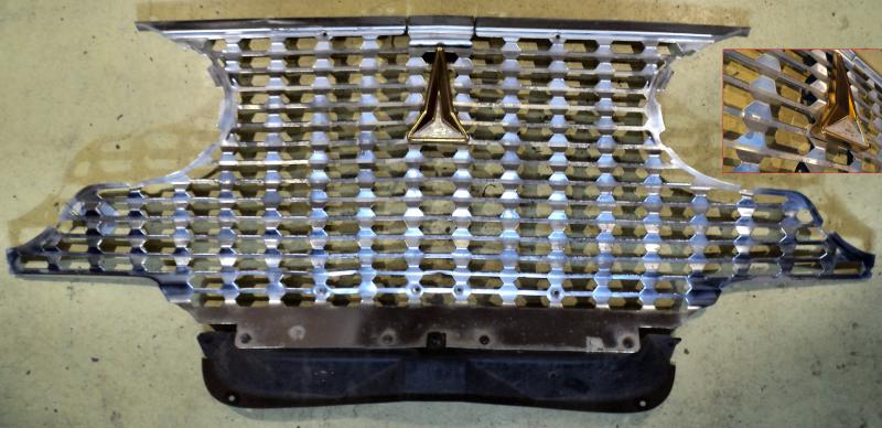 1961 Plymouth Fury   grill  (a lot of color of the grill due to poor masking when re-lacquering)    .  Only in stor