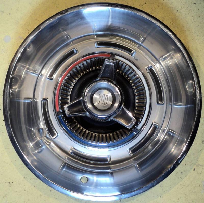 1966  Chrysler 300   5 pcs. Spinner's hubcaps (there are marks see image)