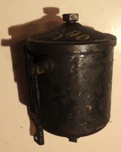 1957   Cadillac       oljefilter behållare