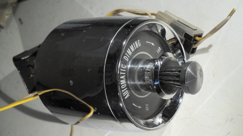 1964   Cadillac  headlight switch  automatic dimmer eye   (pores in chrome)
