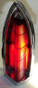 1960    Oldsmobile 88  taillight  (cracks in the glass)       left