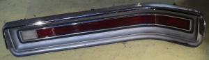 1967   Buick LeSabre    taillight  (2 minor lesions see picture, some pores in the chrome)        right