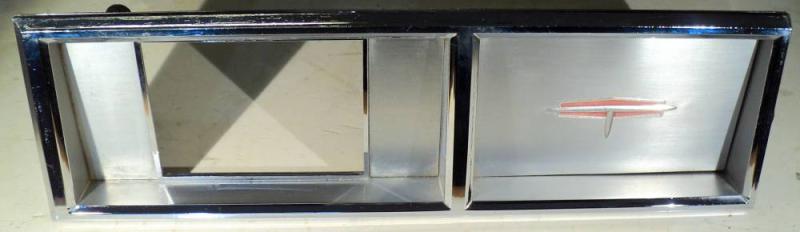 1963   Oldsmobile 88  chrome around the clock on the dashboard