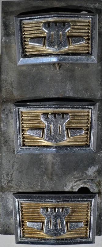 1969 Chrysler Newport    emblem in the middle of the grill (bad mounts see picture)