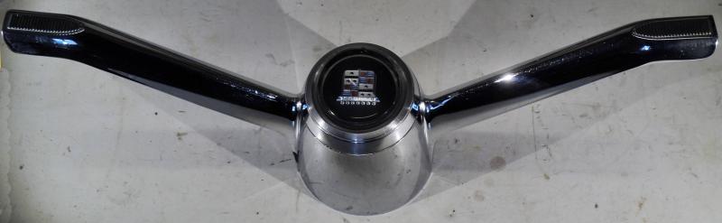1961 Cadillac  DeVille        horn ring (some pores in chrome)