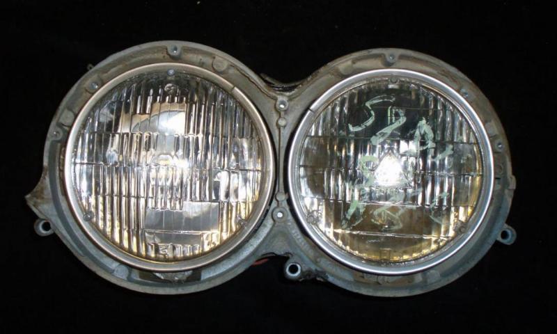 1958 Buick Special headlight pot left